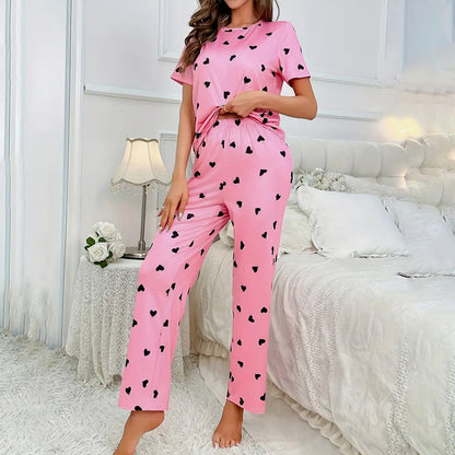Adorable Soft Pink Nightdress with Playful All-Over Black Heart Prints